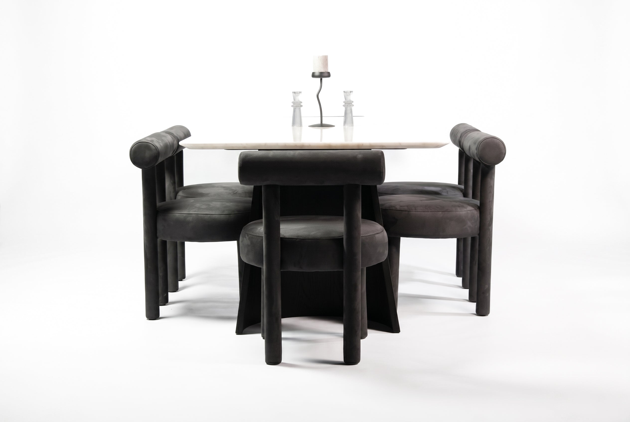 luxury marble dining table with six grey upholstered dining chairs for modern Melbourne homes by Rustic Rooms