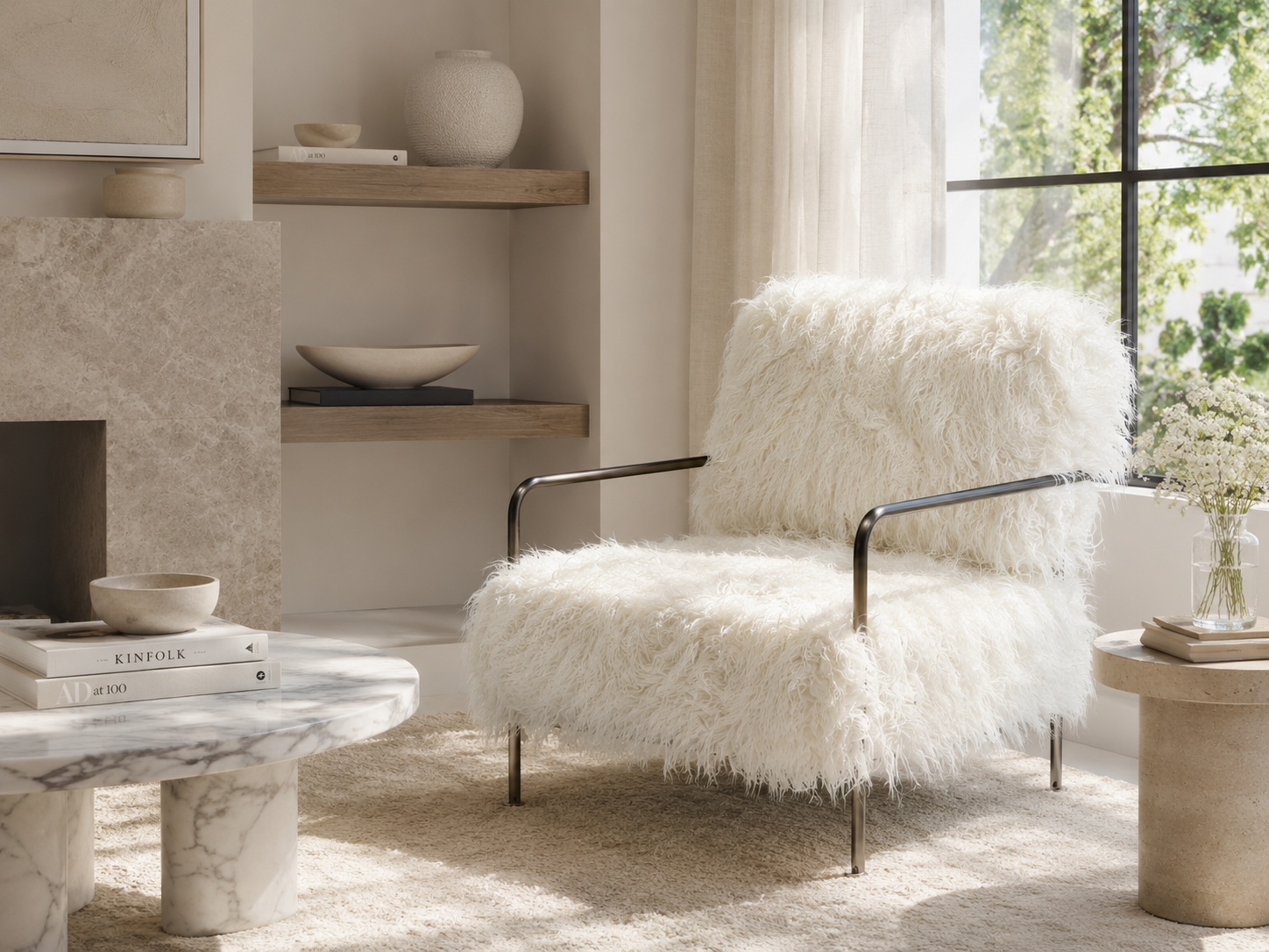 A modern lounge chair with a fluffy white faux-fur seat and back cushion, supported by slim black metal arms and legs, set in a bright, contemporary living room next to a marble coffee table and a window.