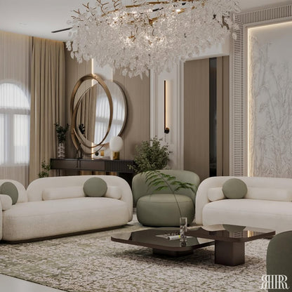 Modern living room with white sofa, green armchair, and decorative chandelier.