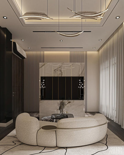 Modern living room with a round beige sofa, stylish ceiling lights, and a mirror.